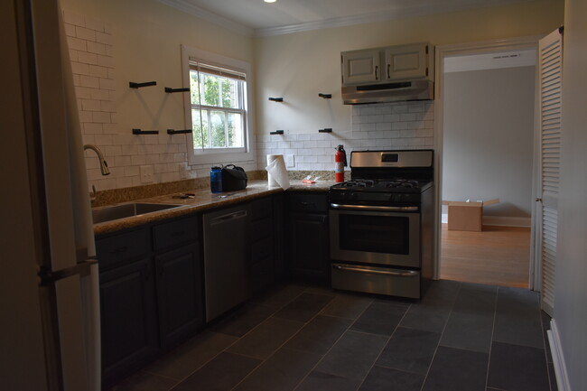 (upstairs unit kitchen shown) downstairs unit kitchen similarly styled - 2303 Goldsmith St