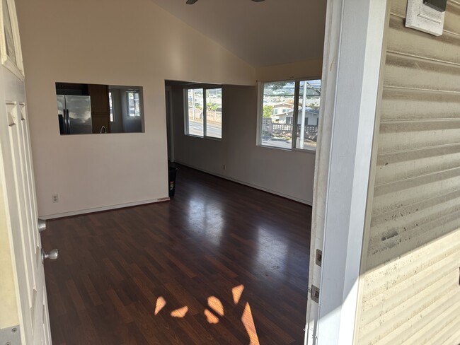 Entrance and living area in the unit - 1876 Palamoi St