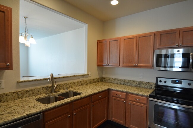 Building Photo - Beautiful townhome near Ft. Carson available to move in!