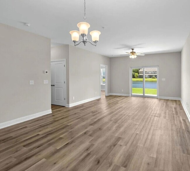 Building Photo - First Floor Comfort Meets Picture Perfect Pond Views