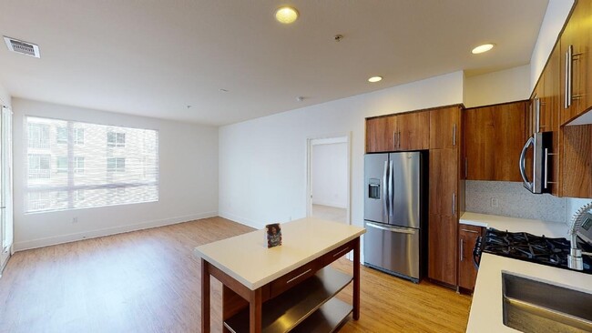 Movable Kitchen Islands are included in all homes, creating an open concept that suits any style - The Adeline