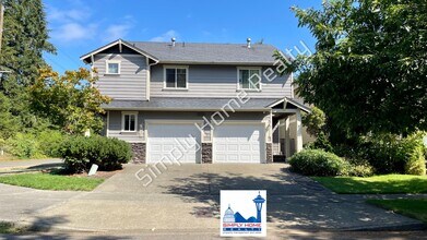 Building Photo - Welcome to Your Corner-Lot Retreat!