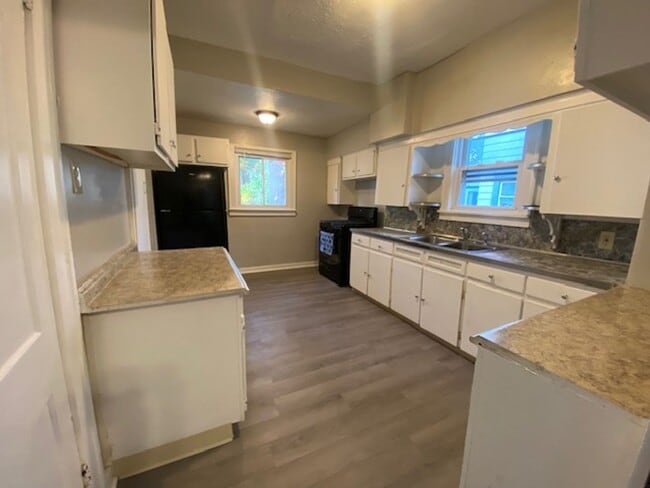 Building Photo - Updated 4-Bed with Porch & 2-Car Garage on...