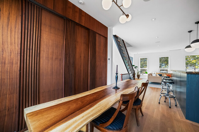 Dining. Sliding doors reveal desk/office - 19 Conselyea St