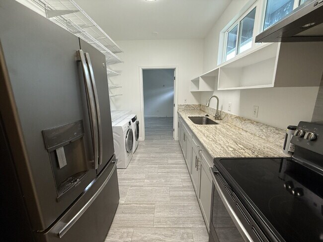 Building Photo - Charming 1-Bedroom, 2-Bathroom Cottage in ...