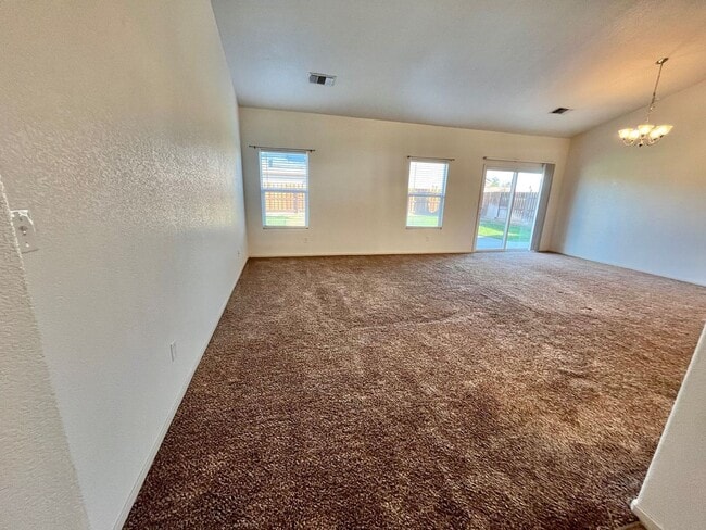 Building Photo - REDUCED!! Large Corner Lot Home with Landscaping included!