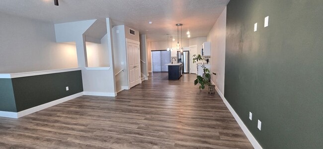 Building Photo - Come check out this beautiful 3 story town...