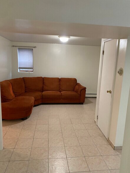 Living/Dining Area (couch can be removed) - 749 S Broad St