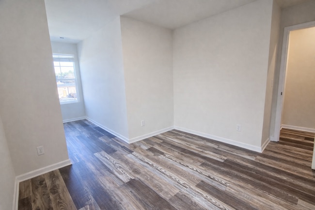 Building Photo - COMING SOON: 3BR Townhome • Full Kitchen • Garage + Driveway