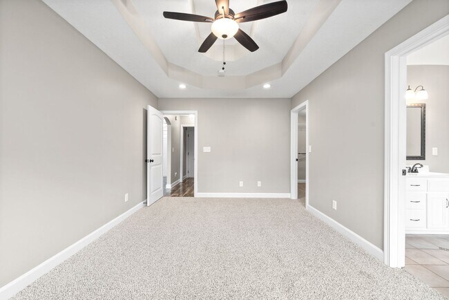 Building Photo - Pet Friendly Three Bedroom with Bonus!