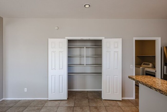 Building Photo - Welcome to this spacious 4 bedroom, 2.5 ba...