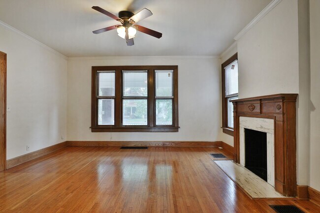 Building Photo - Charming 5-Bedroom Home with Exposed Brick and Modern Upgrades