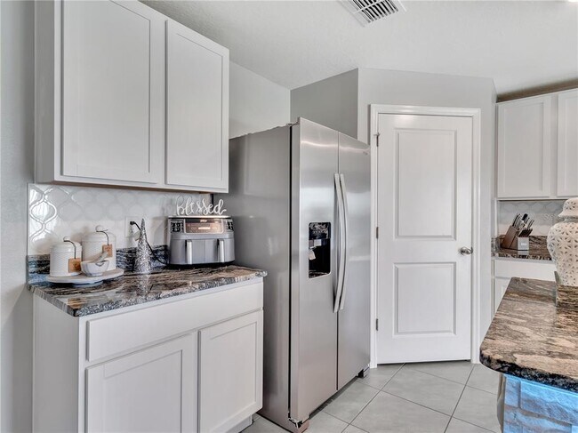 Building Photo - 5289 Fiddle Fig Ave