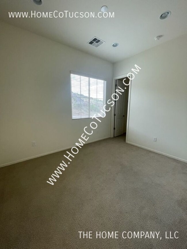 Building Photo - 38628 S Running Roses Ln