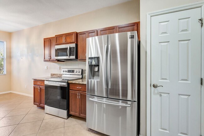 Building Photo - ** AVIANO AT NAPLES ** 3 BED 2 BATH ** ANN...