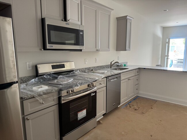 Building Photo - BRAND NEW! Two Bedroom Duplex in Denver