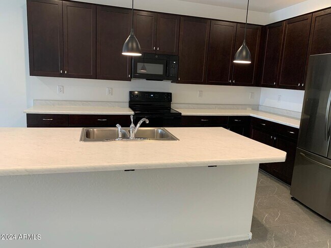 Building Photo - 345 E Caribbean Dr