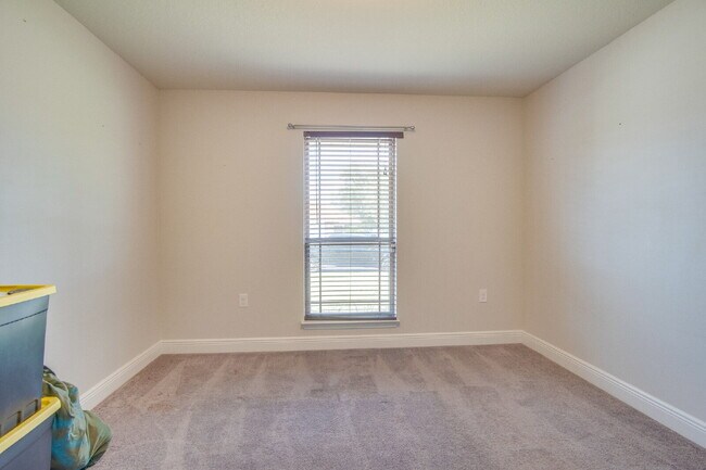 Building Photo - Milton 4BR Pool Home with Office, Vaulted Ceilings, Screened Saltwater Pool & 2-Car Garage