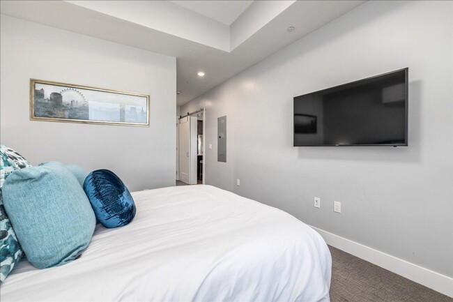 Building Photo - COME HOME TO REFINED DOWNTOWN LUXURY CONDO...