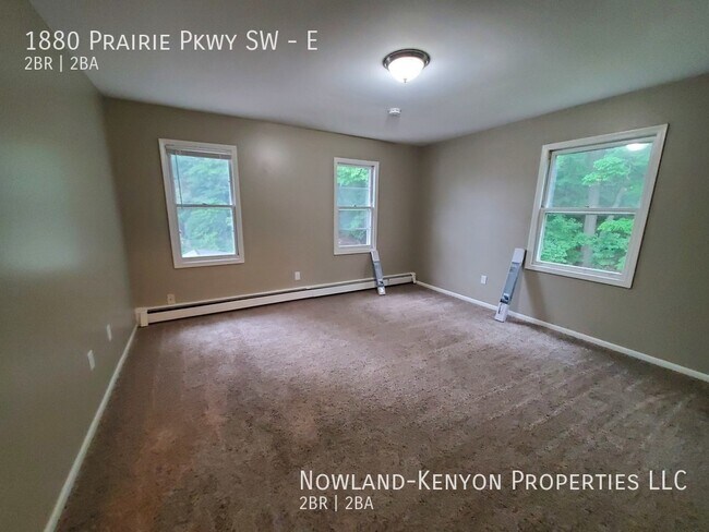 Building Photo - 1880 Prairie Pkwy SW - E- 2 beds, 1 full bath
