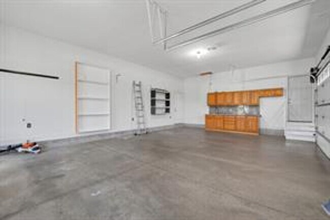 Building Photo - Spacious 5-Bed Walkout Home with Over 3,50...