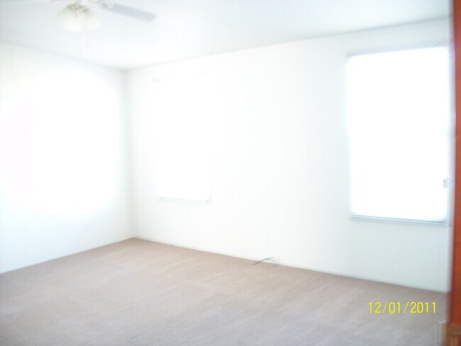 Building Photo - 3 bedroom, 2 bath, large bonus room, large covered porch, mobile home