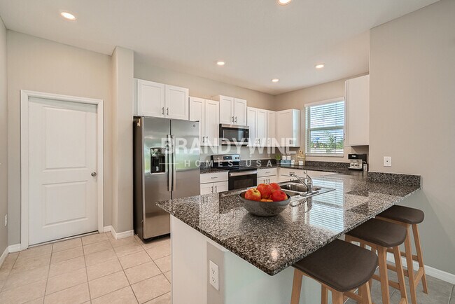 Building Photo - NEW LOWER RENTAL RATE LEASING SPECIAL: Rec...