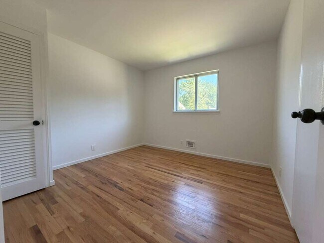 Building Photo - Spacious 4-Bedroom Home with Functional Layout, Backyard Access & Attached Garage