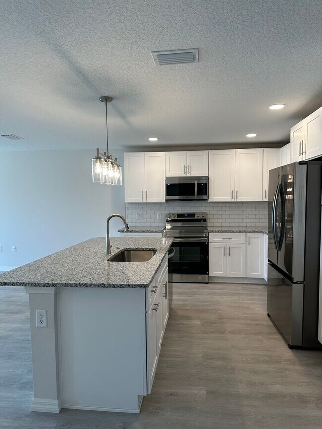 Building Photo - Side A  available soon!