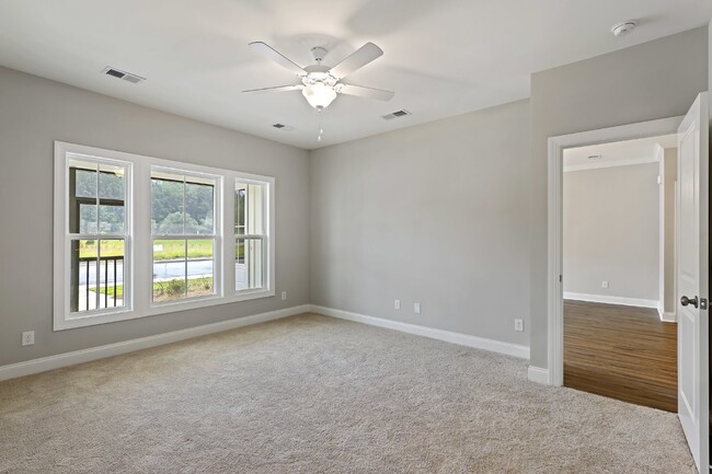 Building Photo - Spacious townhome with a wooded view!