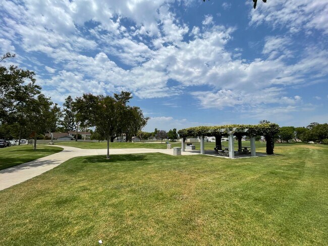 Building Photo - Discover the Essence of Irvine Living!