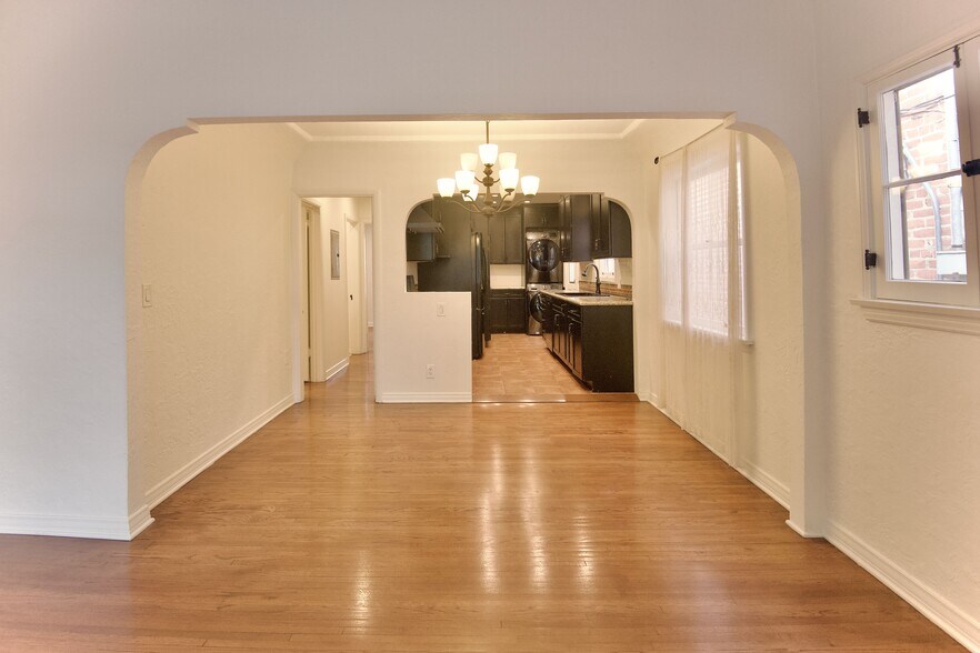 Hallway to left leads to other bedrooms - 4755 Wiota St