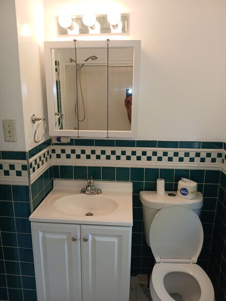 Brand new push button flush toilet - 1200 Commonwealth Ave