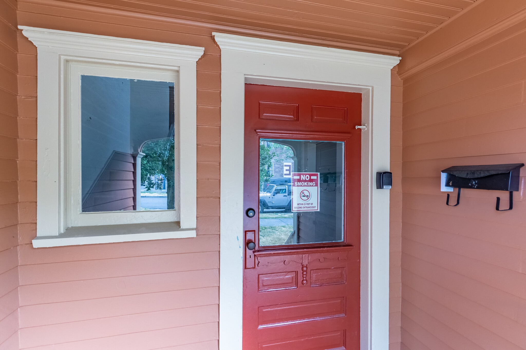 Secured entry door with key in lock box. - 703 Q Ave Apt 4