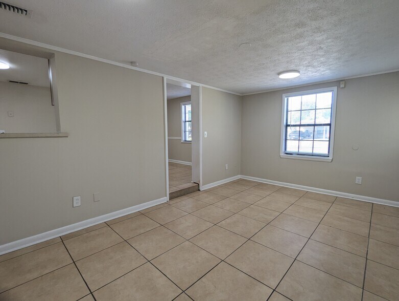 Building Photo - 6941 Delisle Dr
