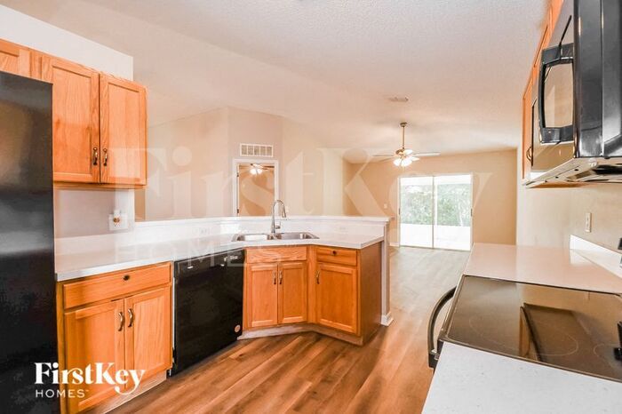Building Photo - 8153 Misty Meadow Ct N