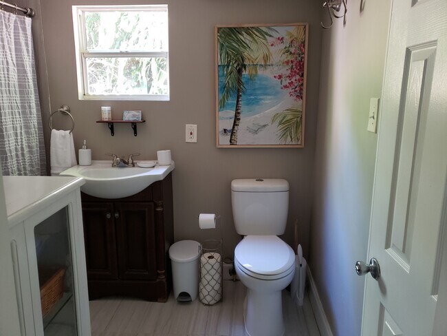 Bathroom with tub and shower - 3050 York St S