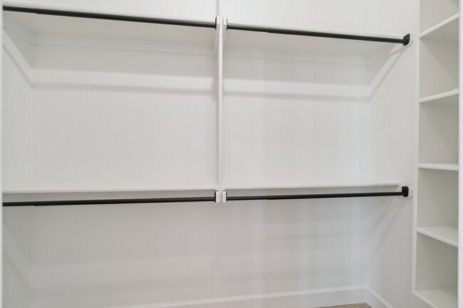 Building Photo - Bright. Clean. Calm. Your Elevated One-Bed...