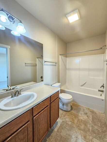 Building Photo - 5205 -5207  E. Upriver Dr.