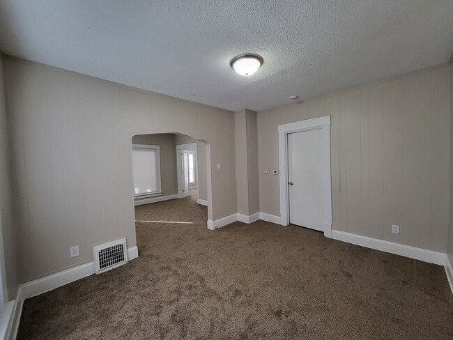 Building Photo - Two bedroom home with partially fenced yard!