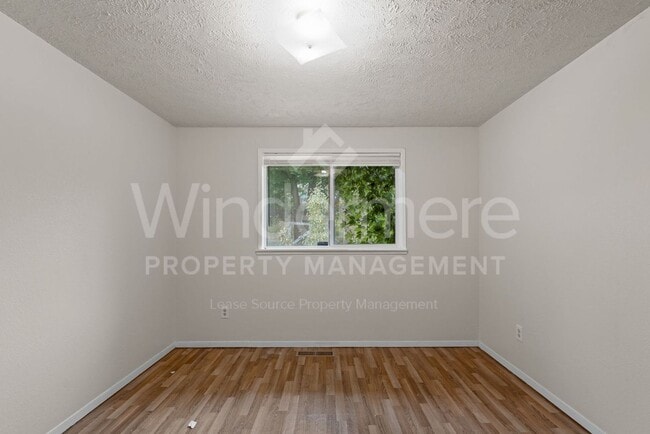 Building Photo - 3828 E 7th Ave