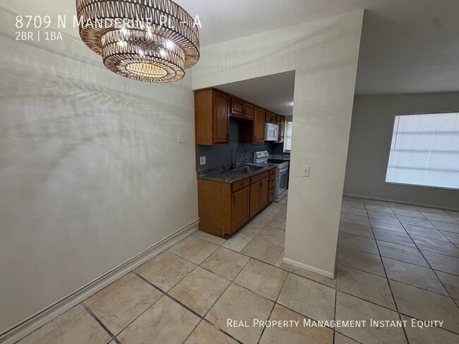 Building Photo - 8709 N Mandarine Pl