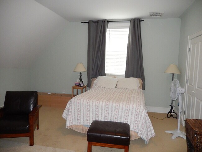 Building Photo - GLAMOROUS 3/2.5 w/ Pond View, Deck, Stainless Appliances, Wood Floors, Fireplace, & More! $2150/m...