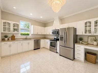 Building Photo - Waterfront Luxury Living | Sunset Views + 5BR + 3-Car Garage