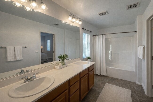 Building Photo - Modern 3-BDR Home in Gated Las Vegas Community | Solar Panels | EV-Ready Garage