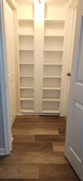 Storage between utility room and bonus room. - 1447 Ridgeland Ct SW