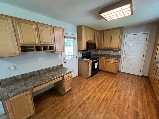 Building Photo - Corner Lot Beauty with Basement & Big Back...