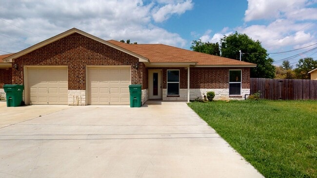 Building Photo - ALL STAINED CONCRETE FLOORING DUPLEX IN HA...