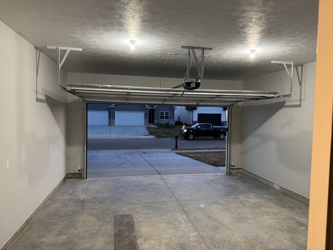 Building Photo - New Construction! West side location. 4br, 3bth, 2crg, Finished basement. All new stainless steel...