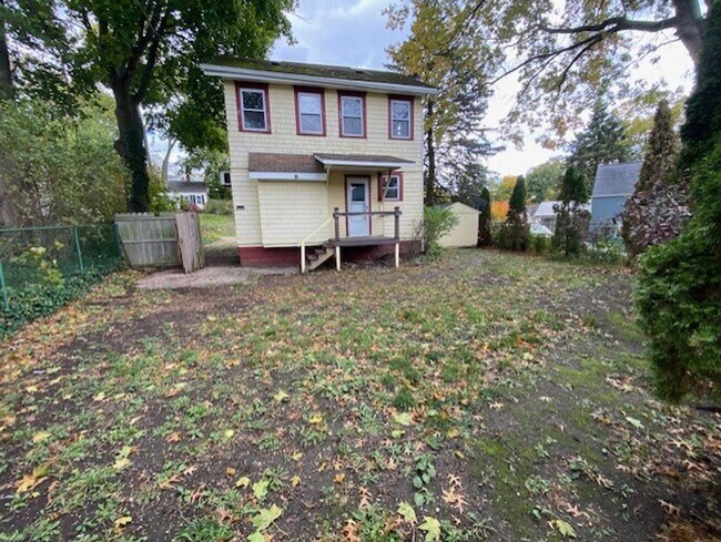 Building Photo - Fenced Yard + Porch in Goodyear Heights—3BR Charmer